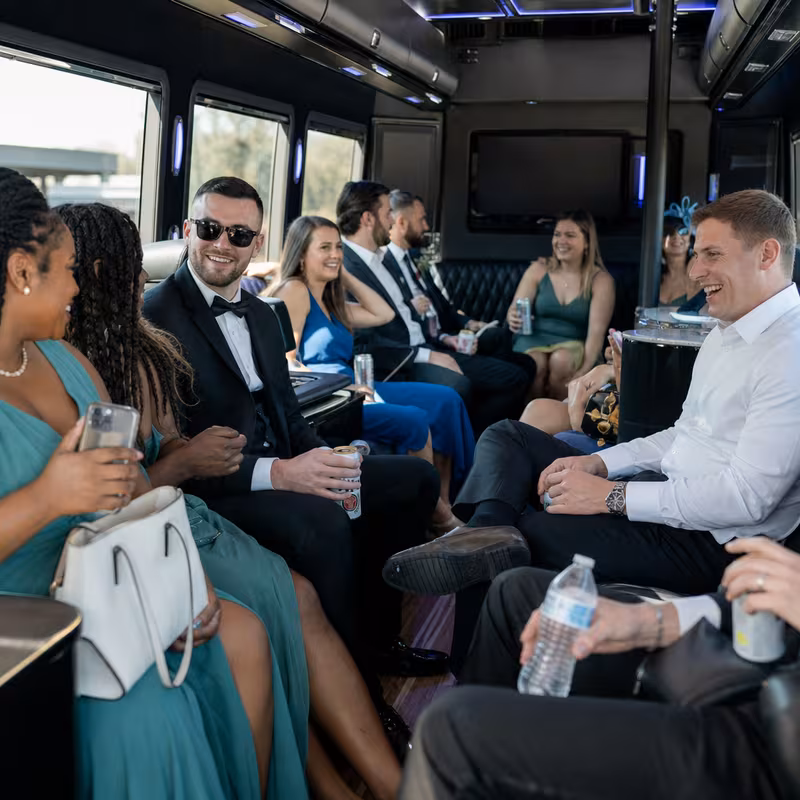 Wedding guests seated inside a Norfolk party bus