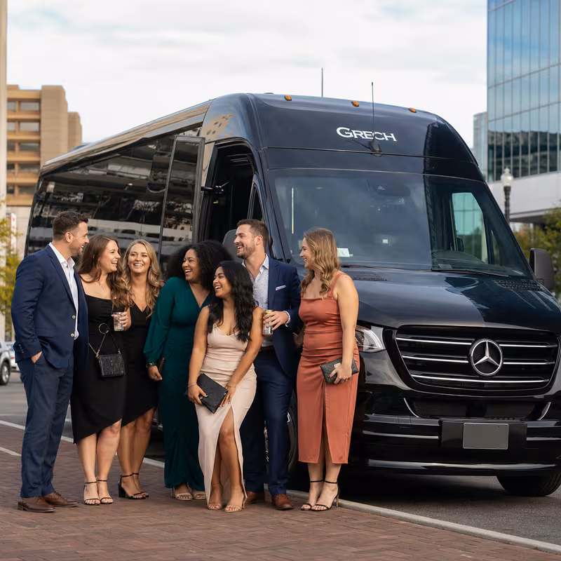 Group boarding a white charter bus for Bachelor & Bachelorette Transportation transportation in Norfolk