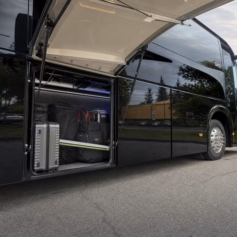 Party bus interior with wraparound leather seating and LED lighting in Norfolk